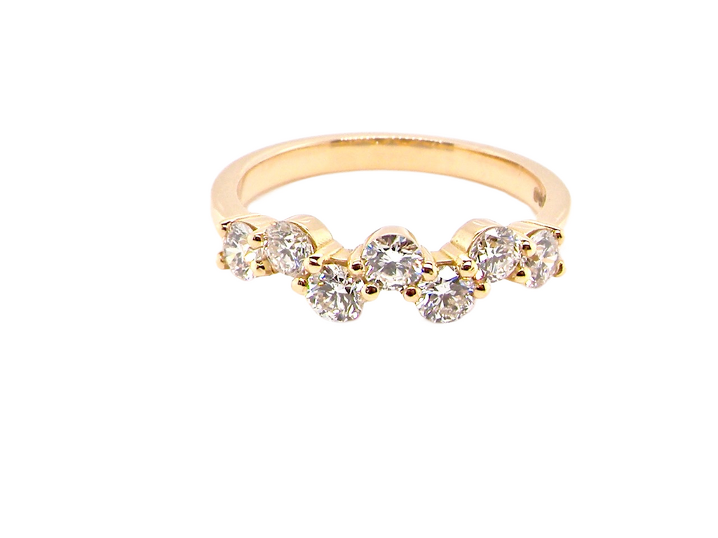 18 carat gold wave design diamond half hoop ring
