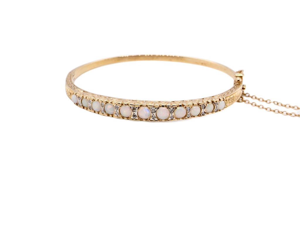  9 carat gold opal bangle