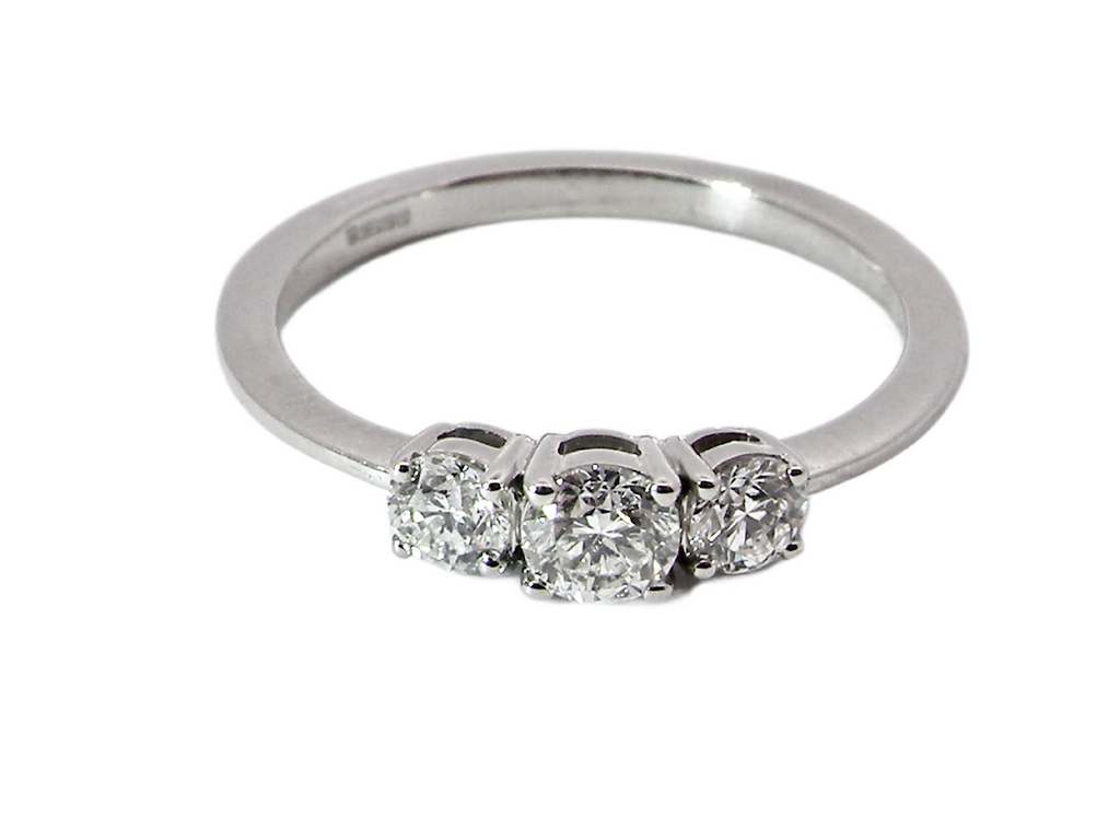 platinum three stone diamond ring