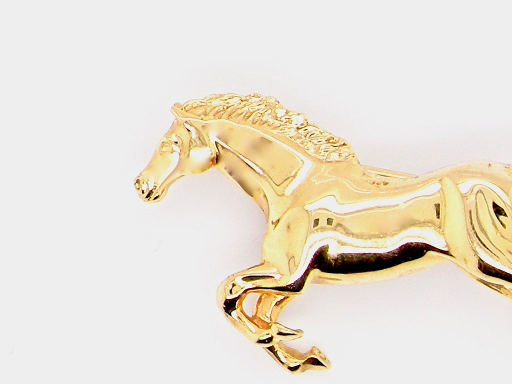 gold horse brooch