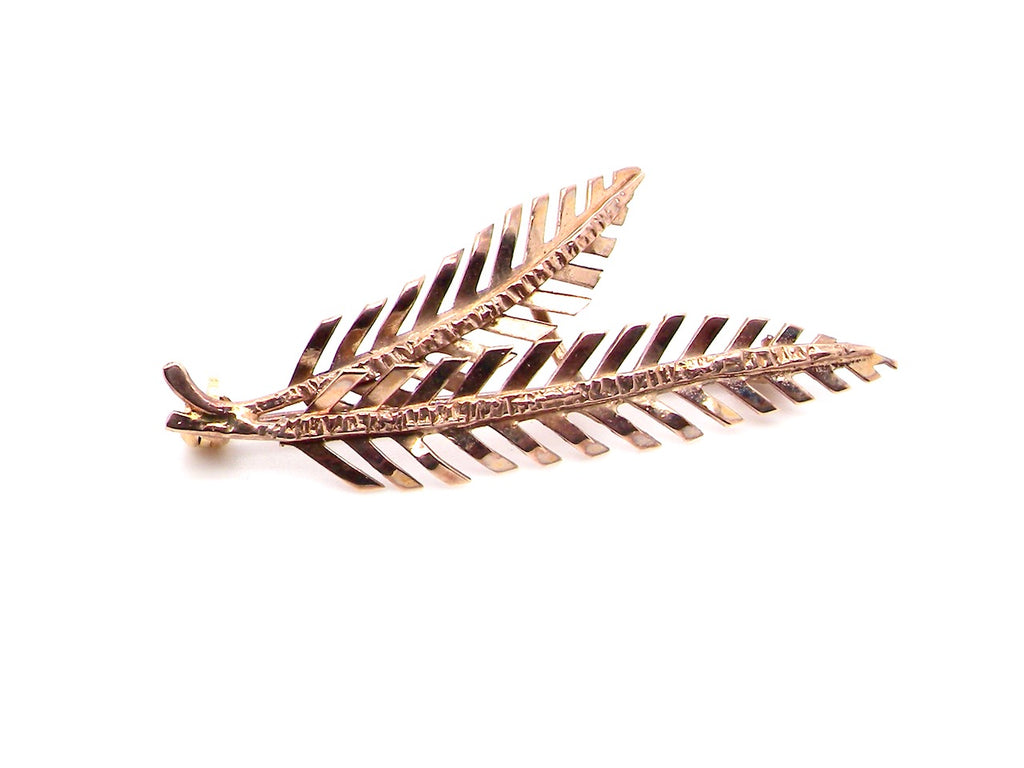 gold fern shaped brooch