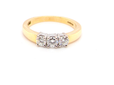 classic three stone diamond ring