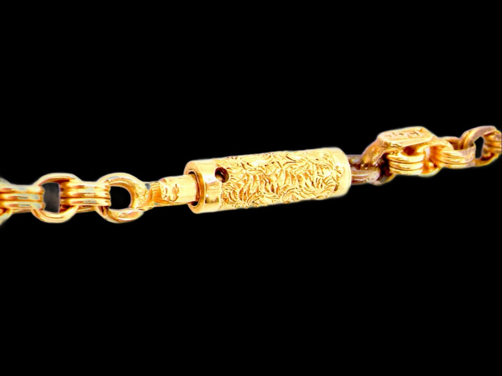 A 15 carat gold barrel clasp