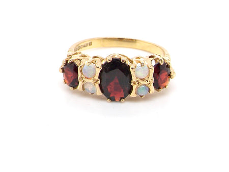 vintage 18 carat gold garnet and opal dress ring