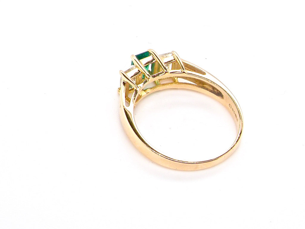 gold emerald and diamond trilogy ring