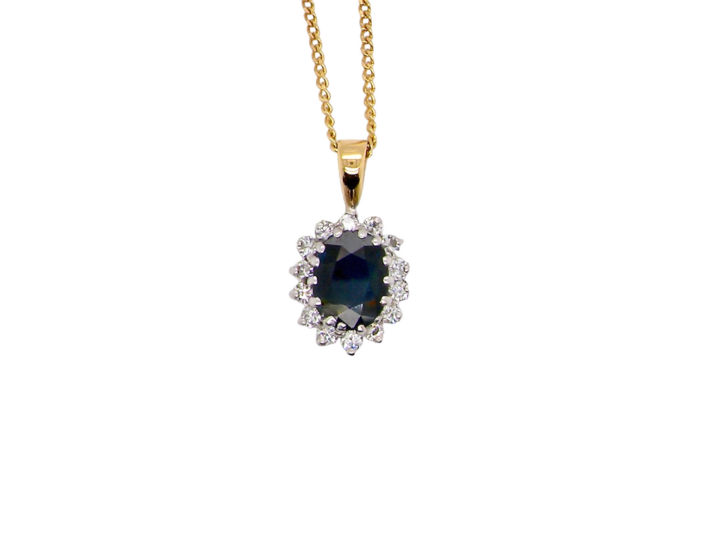 18 carat gold sapphire and diamond pendant