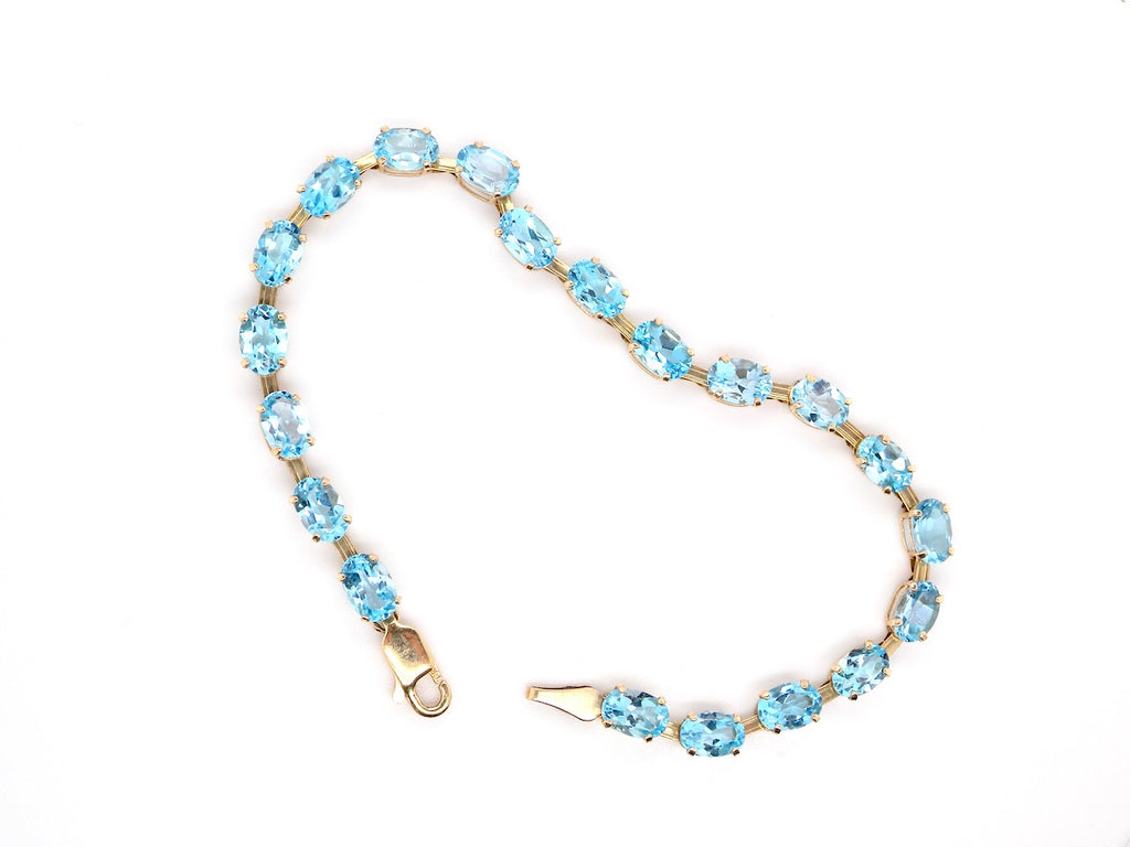9 carat gold blue topaz line bracelet