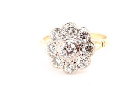 An impressive vintage diamond cluster ring